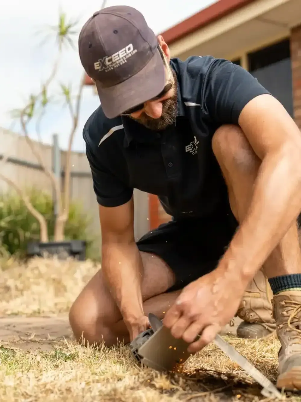 A Golden Grove plumber at work on a job